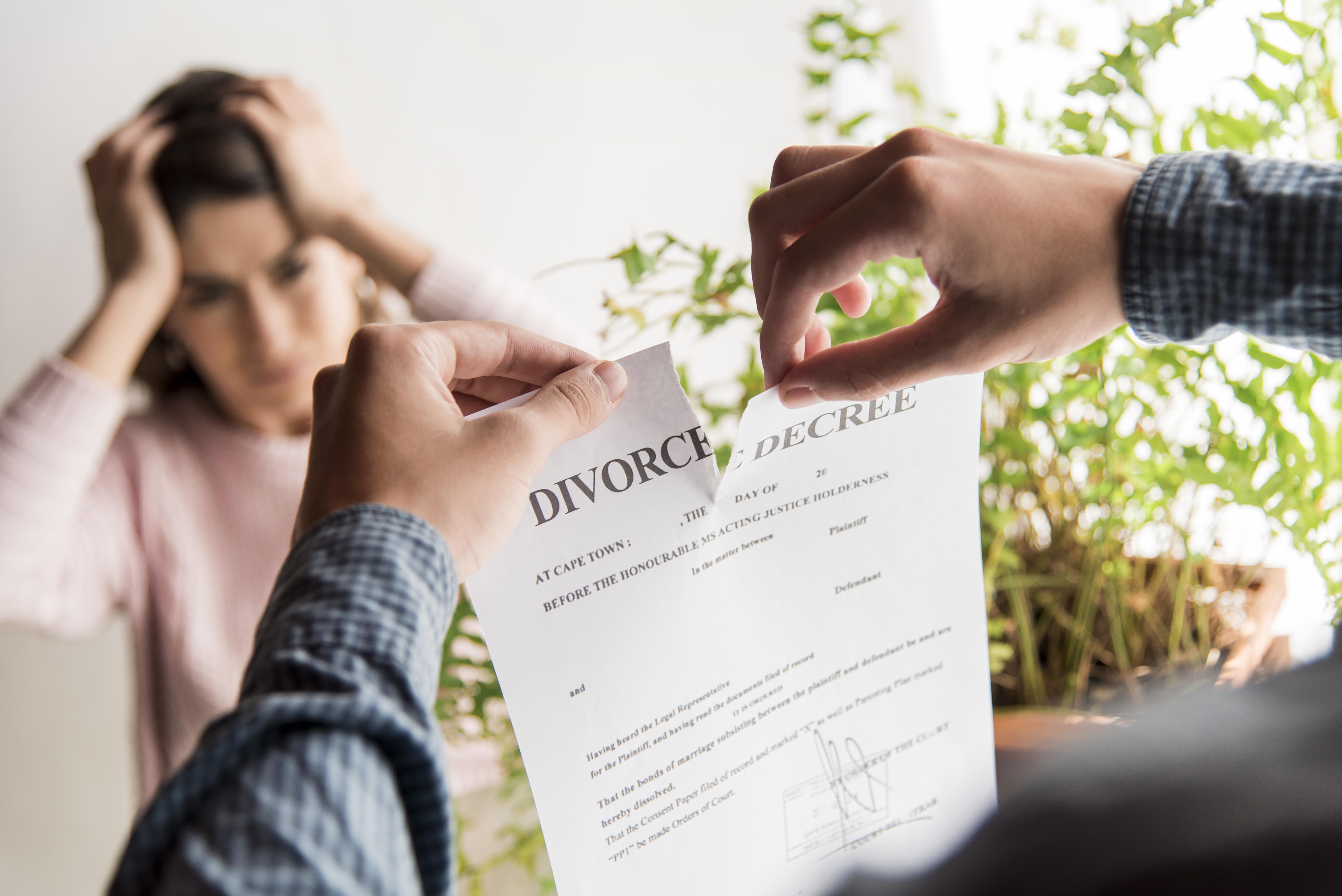 What happens if my spouse refuses to sign divorce papers in Scotland?